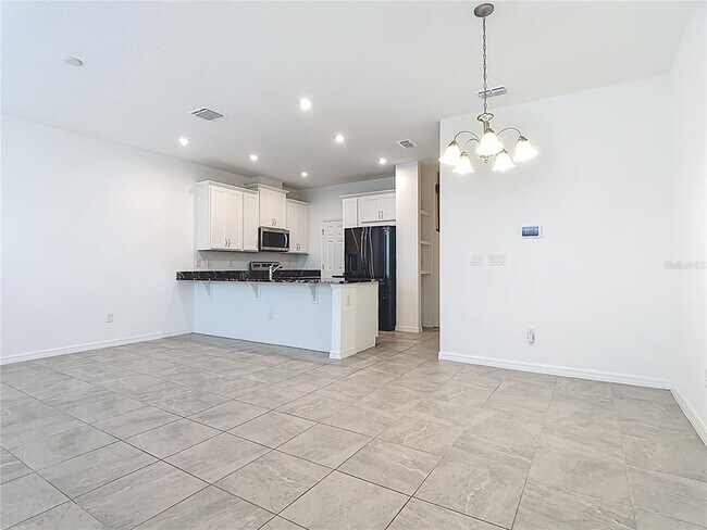 Building Photo - 2512 Blowing Breeze Ave