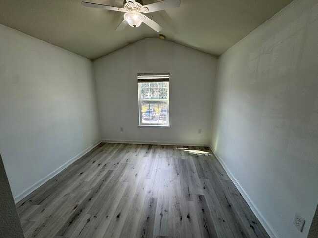 Building Photo - Lake Views. Upgraded Finishes. Gated Commu...