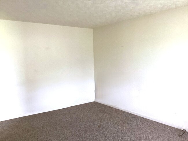 Building Photo - Spacious 3-Bed, 2.5-Bath Ranch-Style Home with Garage & Patio