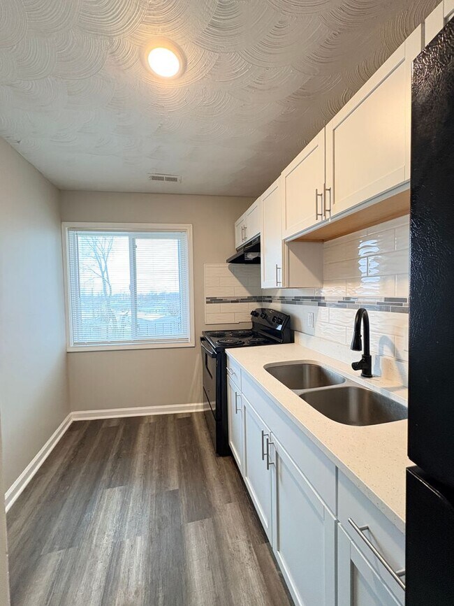 Building Photo - Experience Luxury Living at Bellagio Living I: Modern Apartments in Lawrence, Indiana