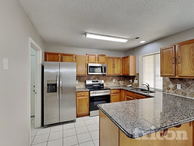 Building Photo - 5000 Poplar Glen Dr