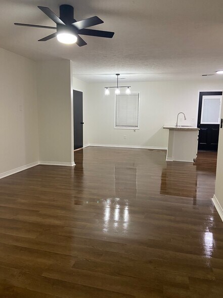 Living Room with Kitchen View - 100 Belle Cir