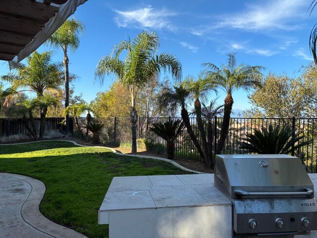 Building Photo - Stunning 4-bedroom hilltop residence nestled in the desirable upper Corona