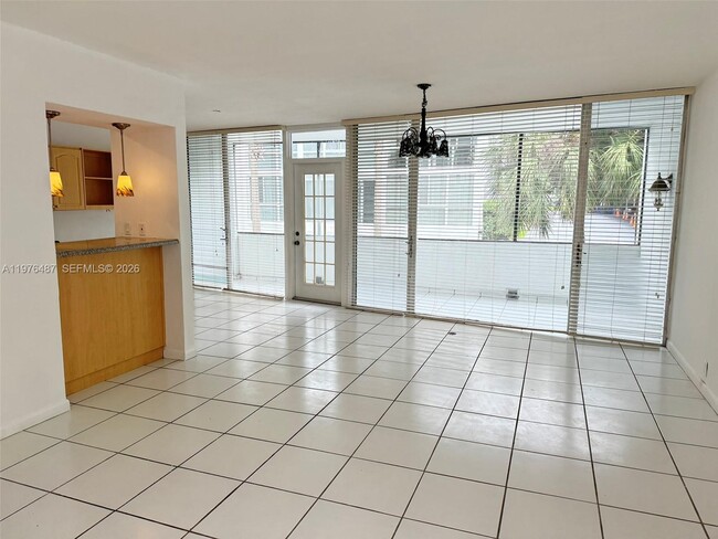 Building Photo - 10210 Collins Ave