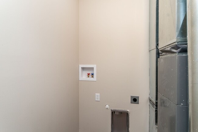 Building Photo - Introducing 303 Sanford: Your Energy-Efficient Haven of Modern Living with a Serene Backyard