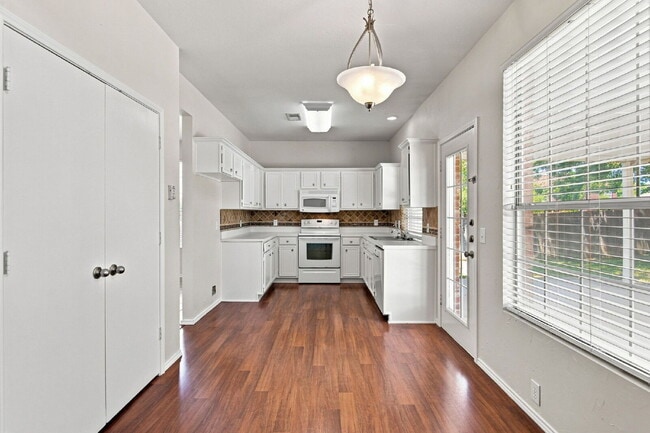 Building Photo - "Spacious Two-Story Home with Multiple Living Spaces and and Expansive Backyard!"