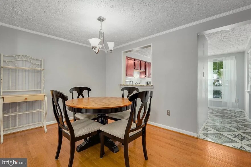 Dining Area and Kitchen - 12504 Timber Hollow Pl