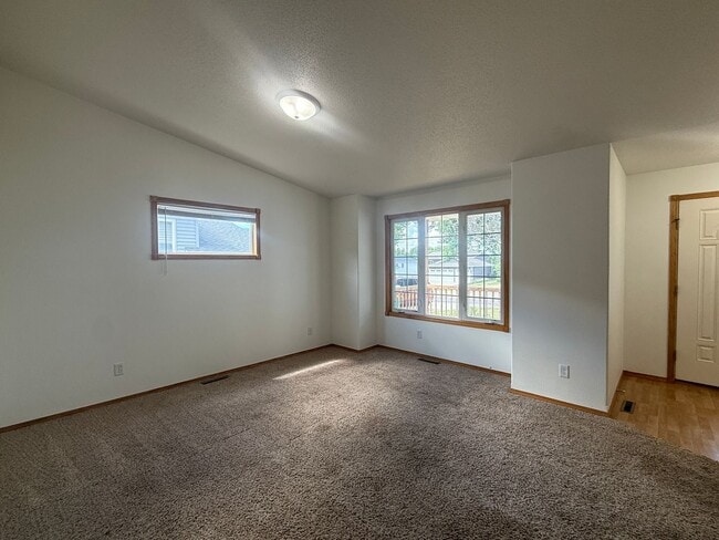 Building Photo - Spacious 3BR Home in Legacy School District with 3 Living Areas & 2-Stall Garage