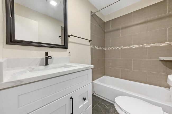 Building Photo - Upgraded and ready 5 bed 2 bath home next door to the 3 bed 2 bath home