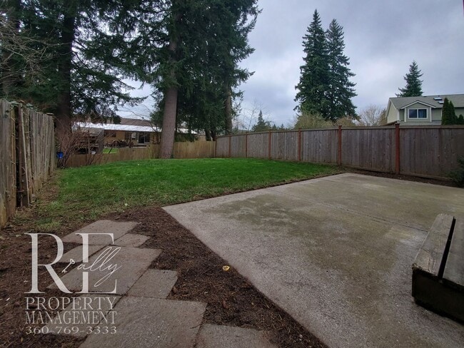 Building Photo - Modernized Two-Story with Open Layout, Gas Fireplace & Large Fenced Yard
