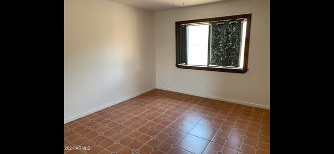 Building Photo - 8995 W Pineveta Dr