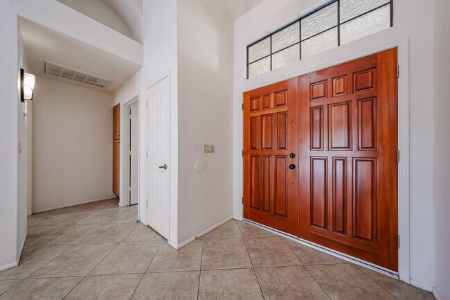 Building Photo - Welcome to this stunning 4-bedroom, 2-bath...