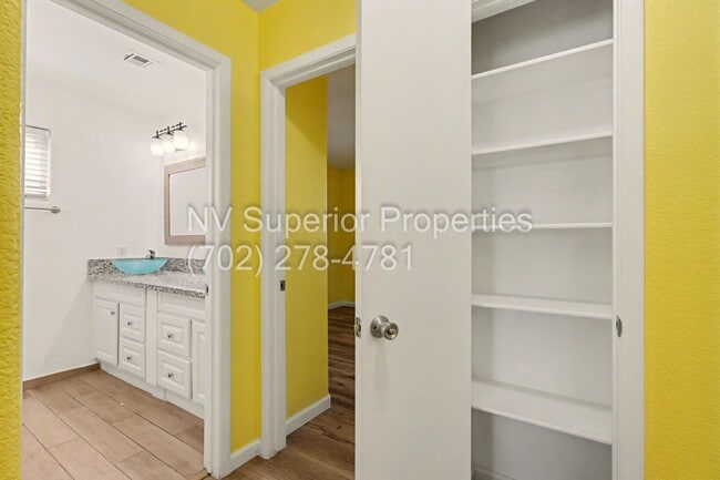 Building Photo - NW!! 4 Bedrooms!!! All Tile and Pergo flooring T/O!! NO Carpet!!! Low Maintenance Desert landscap...