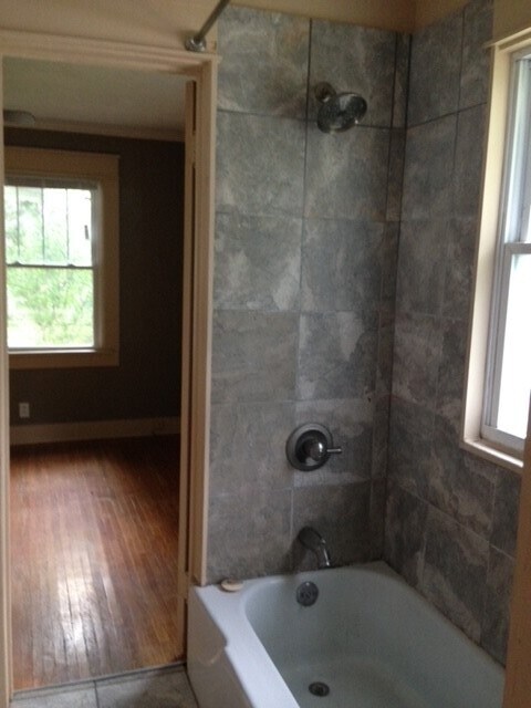 Tiled shower - 209 E Vermilya Ave