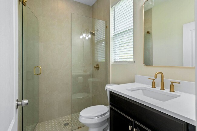 Building Photo - Expansive 4 bedroom, 3 bath remodeled home in gated community