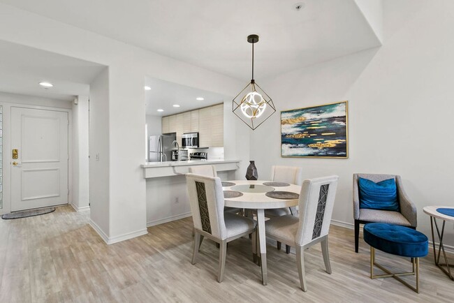 Building Photo - Elegant Furnished Penthouse Retreat with Treetop Views