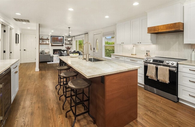 Building Photo - Fully Updated Home with Designer Kitchen, Spa-Style Primary Suite & Large Yard