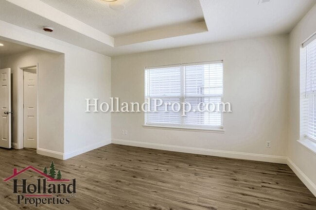 Building Photo - Charming 3-Bedroom Home with Wood Floors, Gas Fireplace & Private Patio