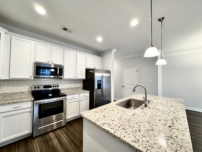 Building Photo - A 1st-Time Rental Available NOW! 3/3.5 Newer End-Unit Townhome w/Garage - Landscaping Included!