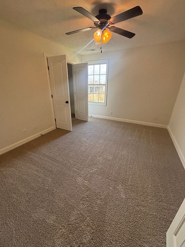 Building Photo - Move-In Ready Rental with Private Fenced Backyard