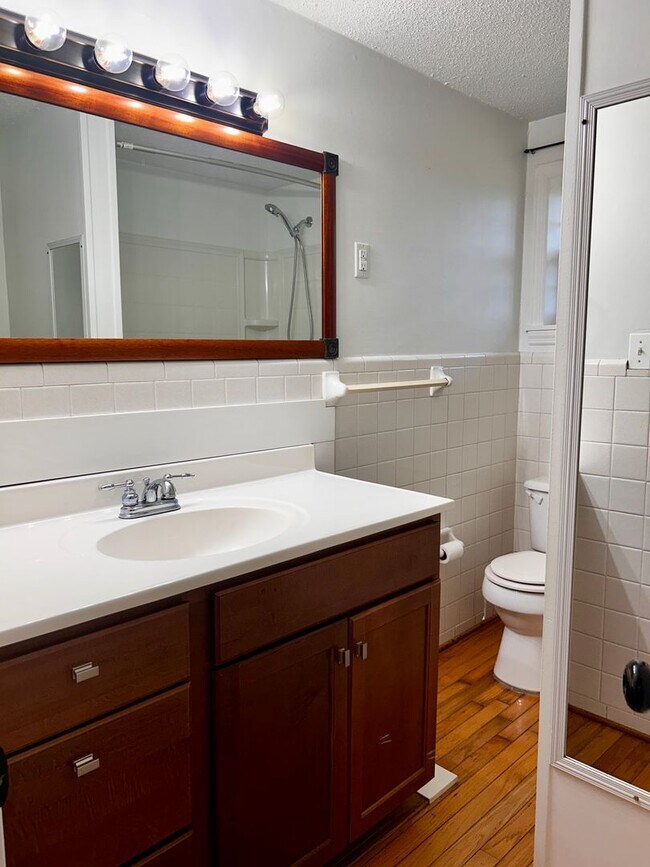 Building Photo - NOW AVAILABLE! 3 Bedrooms/1 1/2 Bath with Double living room space.