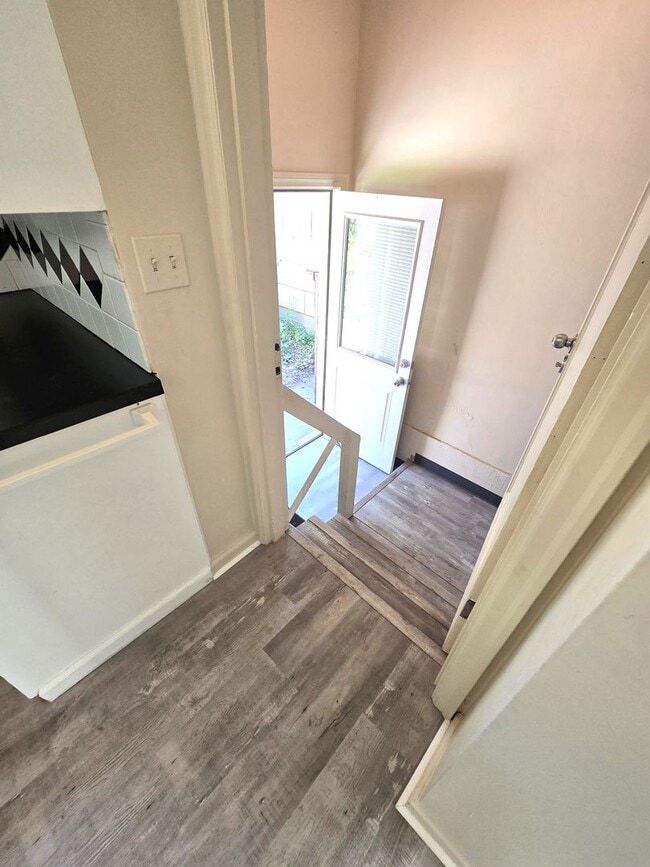 Building Photo - Great Location!  Updated, Two Car garage, Fenced Backyard !