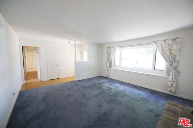 Building Photo - 7309 Asman Ave