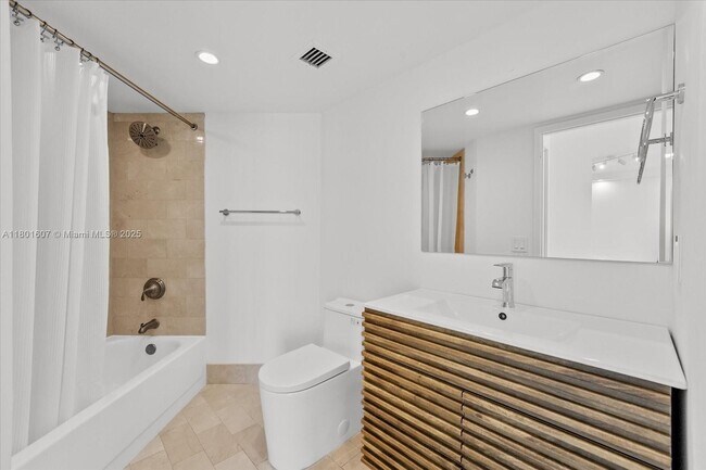 Building Photo - 5880 Collins Ave