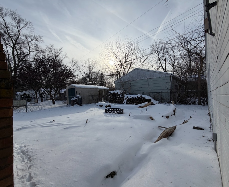 Back yard space, mostly fenced. - 1101 S Cottage Grove Ave