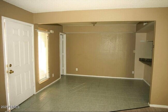 Building Photo - 1424 N 53rd Ave