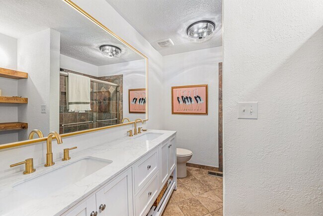 Building Photo - Renovated Lakefront 5 Bedroom Home with 2 Garages!