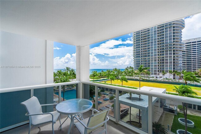 Building Photo - 10275 Collins Ave