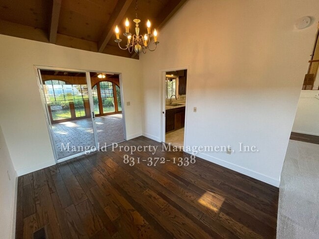 Building Photo - Beautiful 4-bed 2-bath Home with Cozy Fireplace, Front and Back Yards and Large Windows!