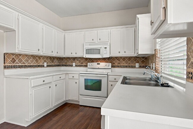 Building Photo - "Spacious Two-Story Home with Multiple Living Spaces and and Expansive Backyard!"