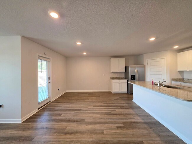 Building Photo - Nearly New 4BR/2BA home close to I10 with energy savings built in