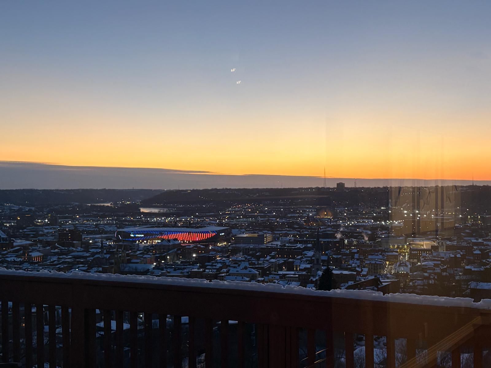 Sunset view from balcony - TQL stadium lights up - 1925 Auburn Ave