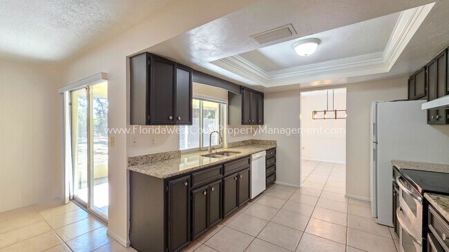 Building Photo - GULF GATE SARASOTA! OUTSTANDING 3 BEDROOM/2 BATH HOME WITH EXTRA LARGE YARD!