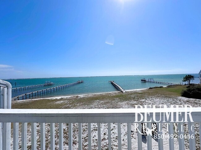 Building Photo - Move-In Ready Intercoastal Waterfront Townhome Steps to the water