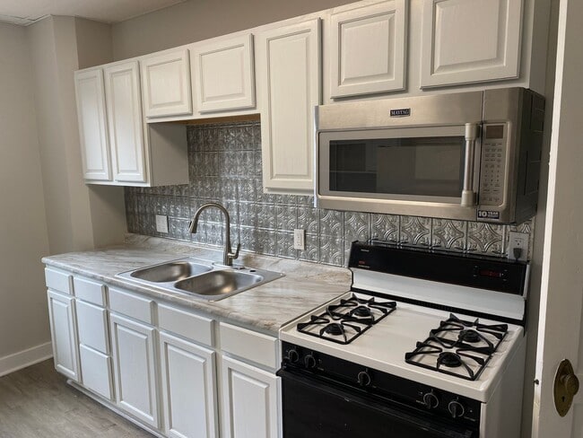 Primary Photo - 2 Bedroom + Den, Updated Row House with Of...