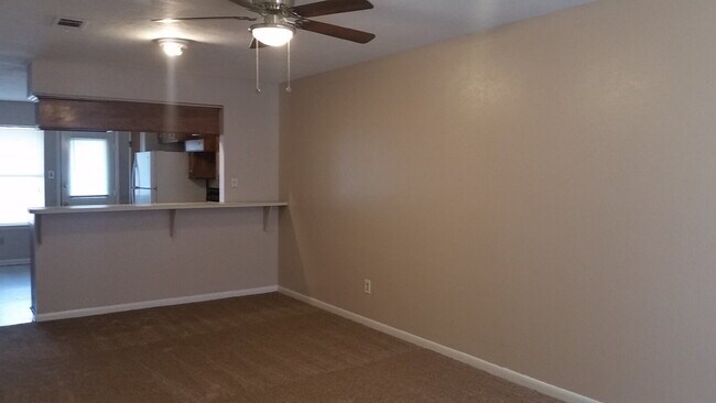 Building Photo - The right side unit of this duplex offers a comfortable and functional layout ideal for small fam...