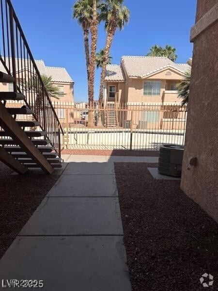 Building Photo - 1830 N Pecos Rd