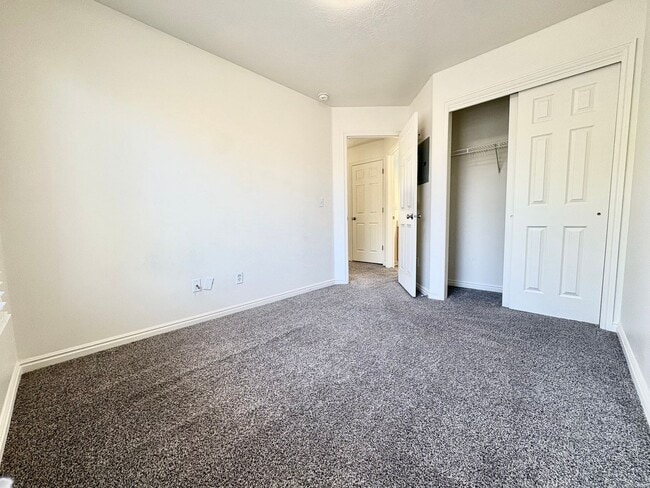 Building Photo - Spacious 3 Bed Townhome in West Valley City with Gated Yard, Garage & Pool