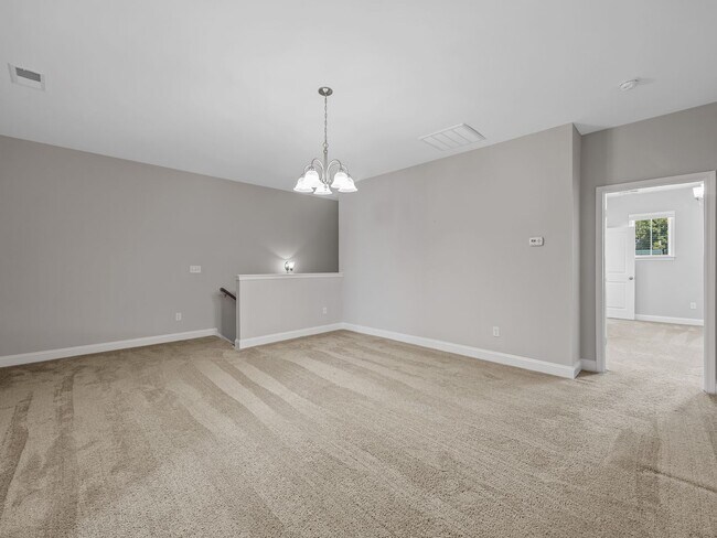 Building Photo - **MOVE IN SPECIAL! 50% off first month's rent!!** Spacious 4BR Townhouse with 2-Car Garage Near D...