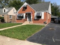 Building Photo - FREE APPLICATION!! Beautiful 4 bedroom house in great Dolton neighborhood w/ Huge Back Yard!