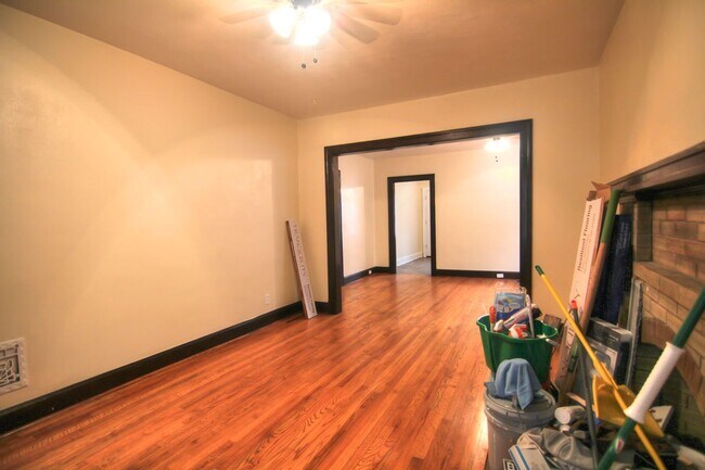 Building Photo - This 2 bedroom 1 bath home has been completely refinished with brilliant hardwood floors throughout!