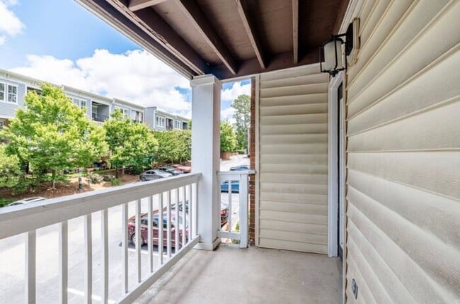 Building Photo - Spacious 2-Bedroom Elite Apartment with Private Balconies & Washer/Dryer