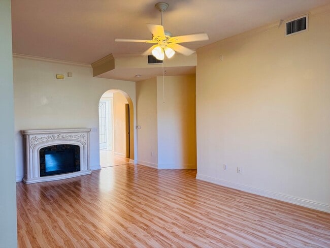 Building Photo - Experience Bell Tower Park. GATED ground floor 2 Bed 2 Bath Den 1 Car Garage Condo.