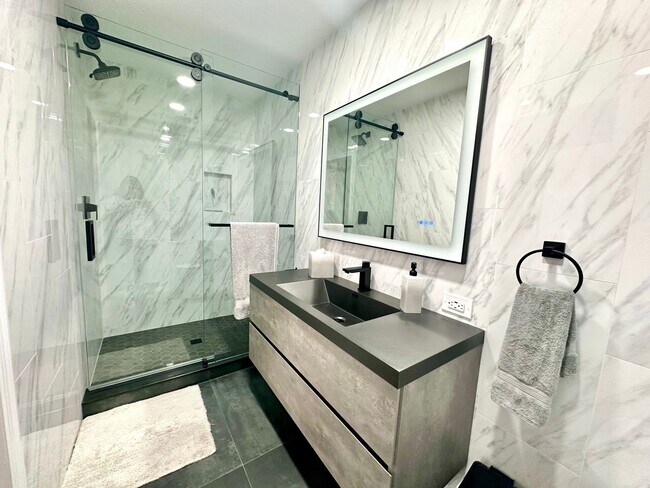 Building Photo - Bright, breezy & convenient: Your wew St. ...
