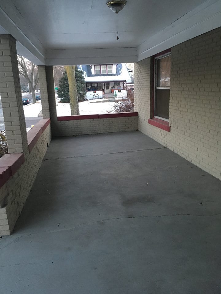 10x30 front porch with cement floor. Lots of room for outdoor furiture, grille and relaxing evening - 1545 S 13th St