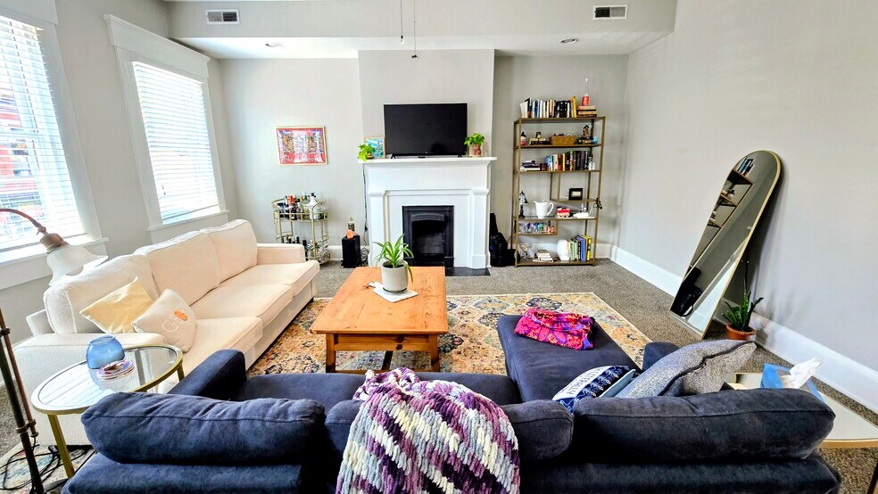 Large living room with natural light - 806 Main St